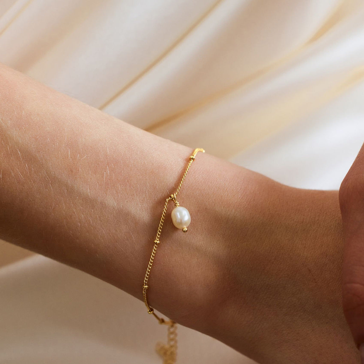 Women's stainless steel bracelet close-up detail